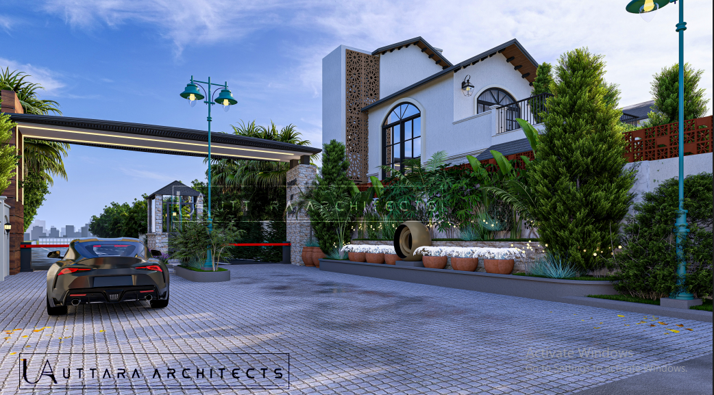Villa and entrance court beside landscaped driveway